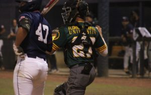 FNU catcher Adrian Roman.