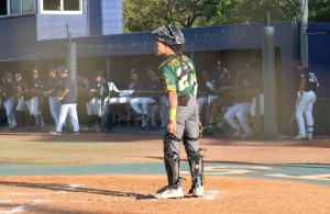 FNU catcher Adrian Roman.